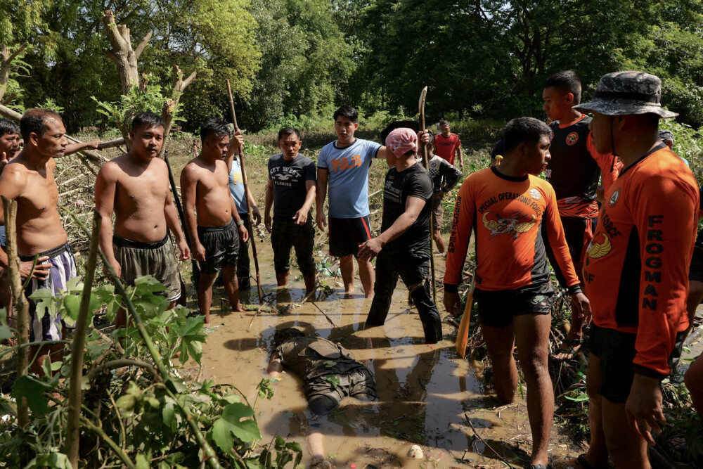 Furtuna tropicală Trami a lăsat în urma sa cel puţin 100 de morţi în Filipine. FOTO - Imaginea 2