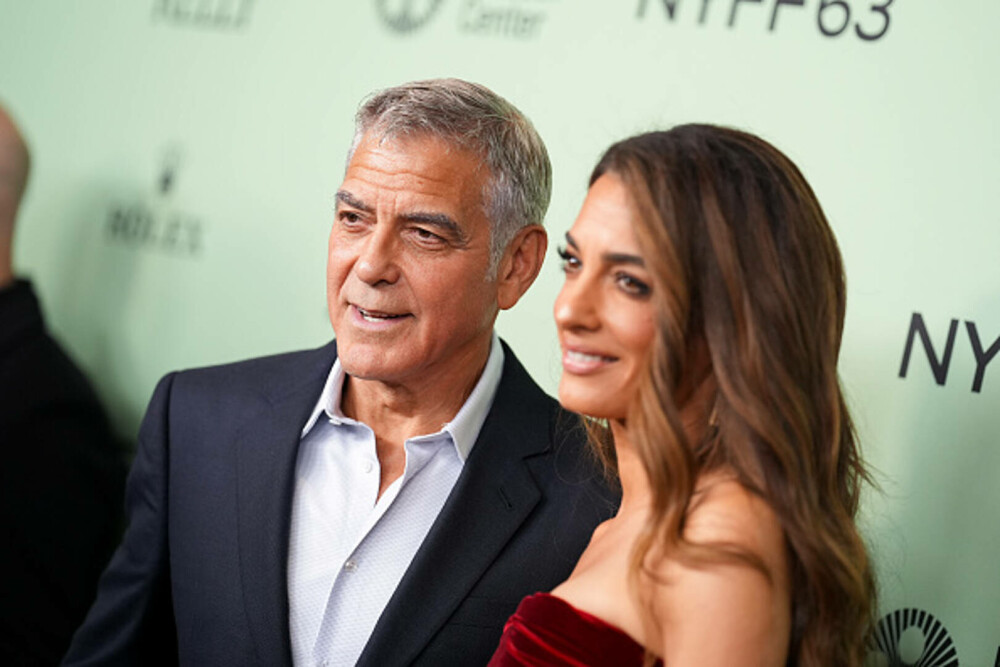 Amal și George Clooney au făcut senzație pe covorul roșu la Londra. Cuplul a atras toate privirile. GALERIE FOTO - Imaginea 33