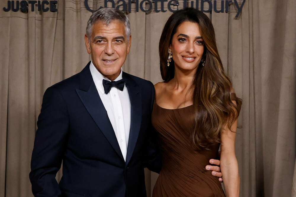 Amal și George Clooney au făcut senzație pe covorul roșu la Londra. Cuplul a atras toate privirile. GALERIE FOTO - Imaginea 31