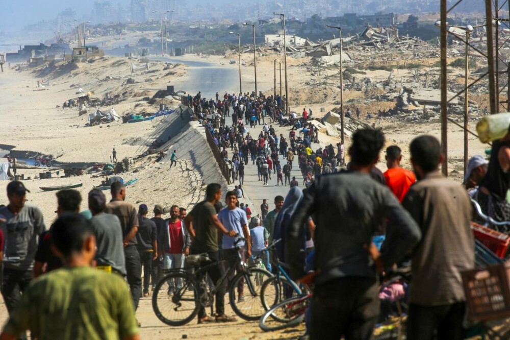 VIDEO și FOTO. Imagini impresionante. Locuitorii din Fâșia Gaza se întorc la casele lor după doi ani de război - Imaginea 1