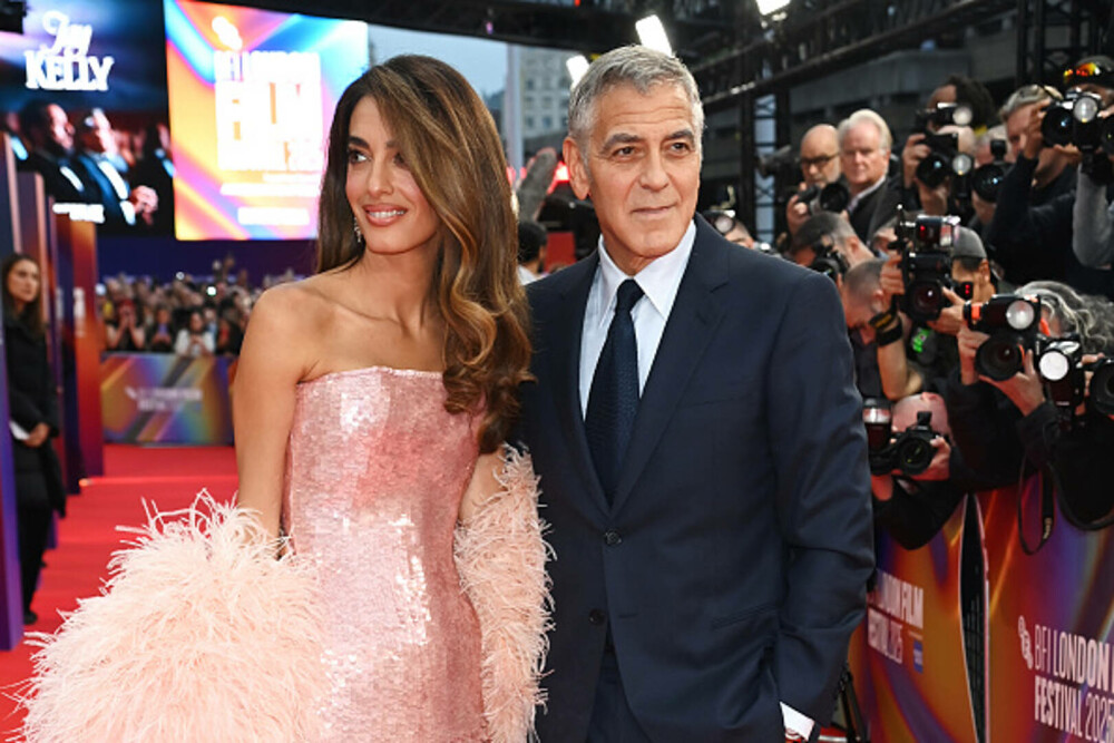 Amal și George Clooney au făcut senzație pe covorul roșu la Londra. Cuplul a atras toate privirile. GALERIE FOTO - Imaginea 4