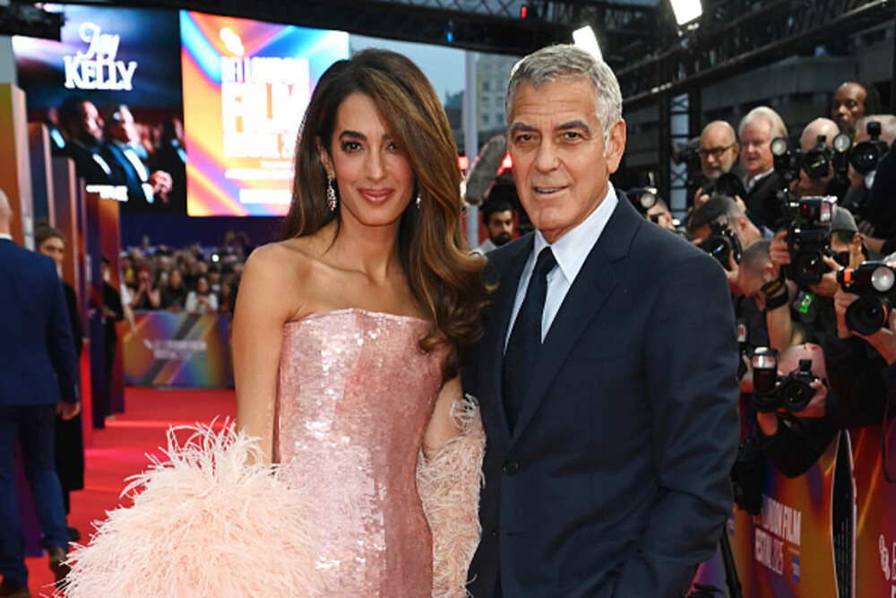 Amal și George Clooney au făcut senzație pe covorul roșu la Londra. Cuplul a atras toate privirile. GALERIE FOTO - Imaginea 7