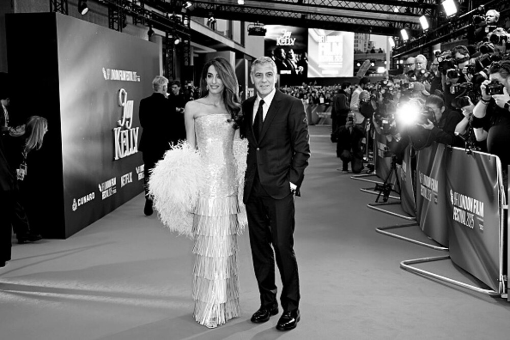 Amal și George Clooney au făcut senzație pe covorul roșu la Londra. Cuplul a atras toate privirile. GALERIE FOTO - Imaginea 9