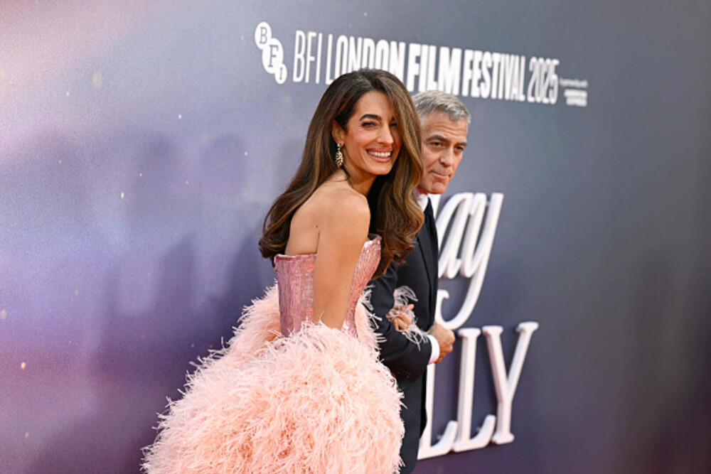 Amal și George Clooney au făcut senzație pe covorul roșu la Londra. Cuplul a atras toate privirile. GALERIE FOTO - Imaginea 11