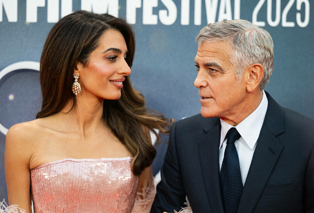 Amal și George Clooney au făcut senzație pe covorul roșu la Londra. Cuplul a atras toate privirile. GALERIE FOTO - Imaginea 12