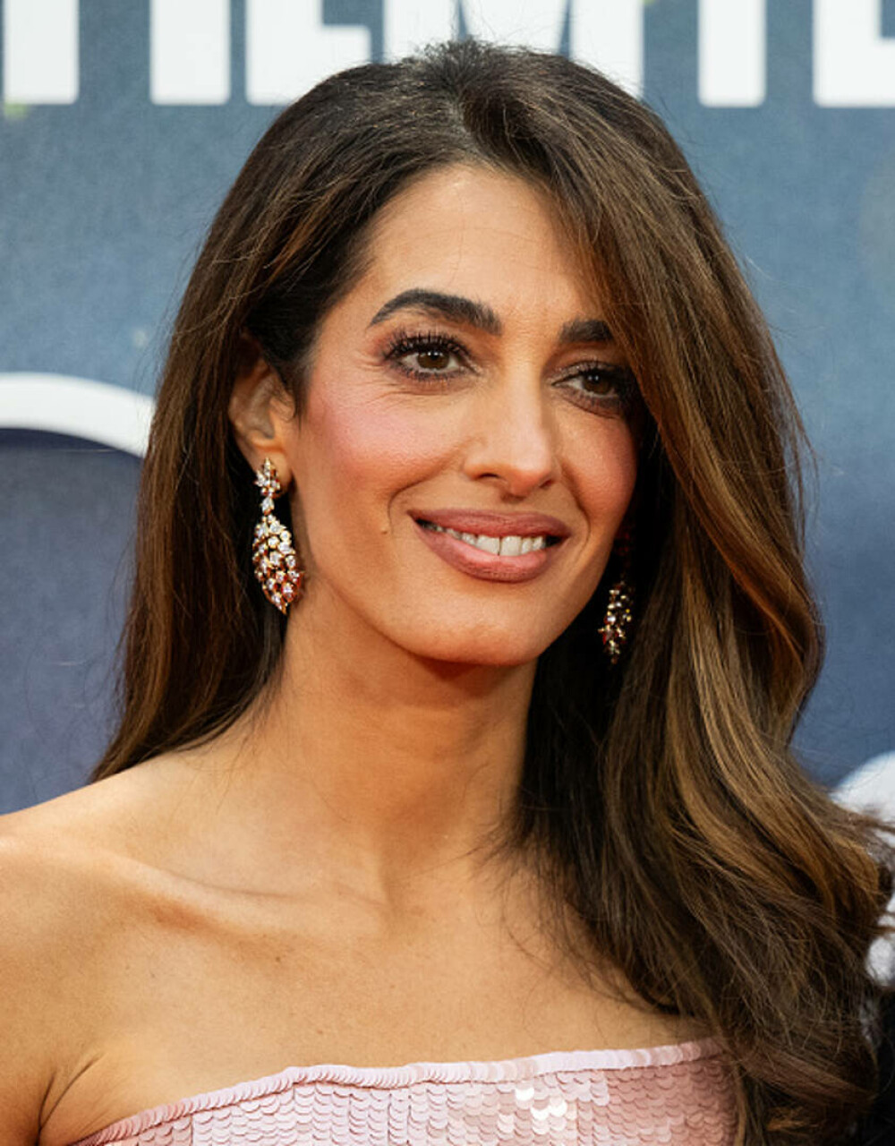 Amal și George Clooney au făcut senzație pe covorul roșu la Londra. Cuplul a atras toate privirile. GALERIE FOTO - Imaginea 14