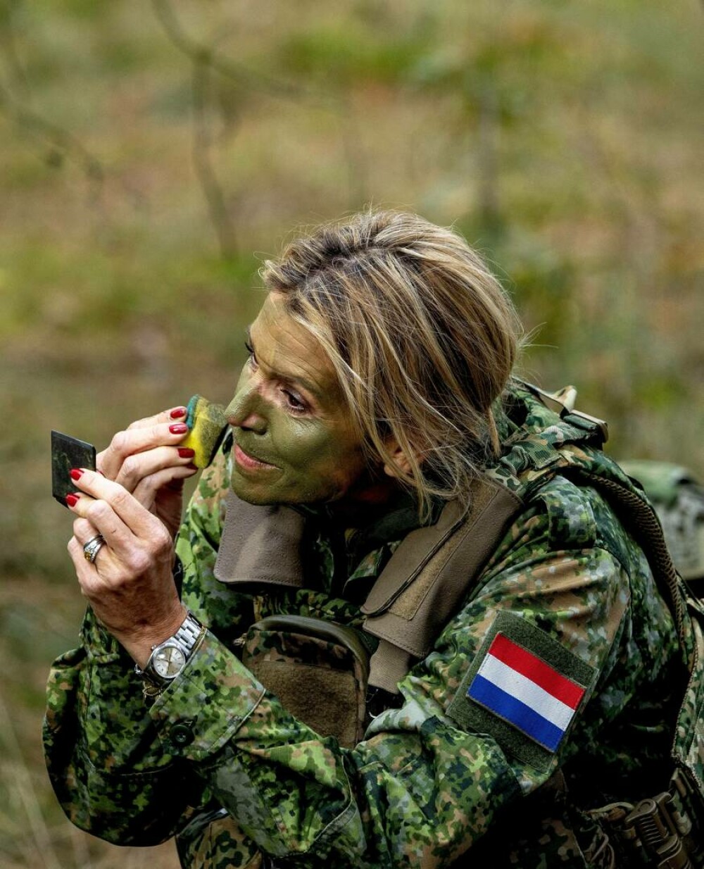 Regina Maxima a Țărilor de Jos, în uniformă militară și cu fața vopsită în culori de camuflaj. Ce s-a întâmplat | FOTO - Imaginea 16