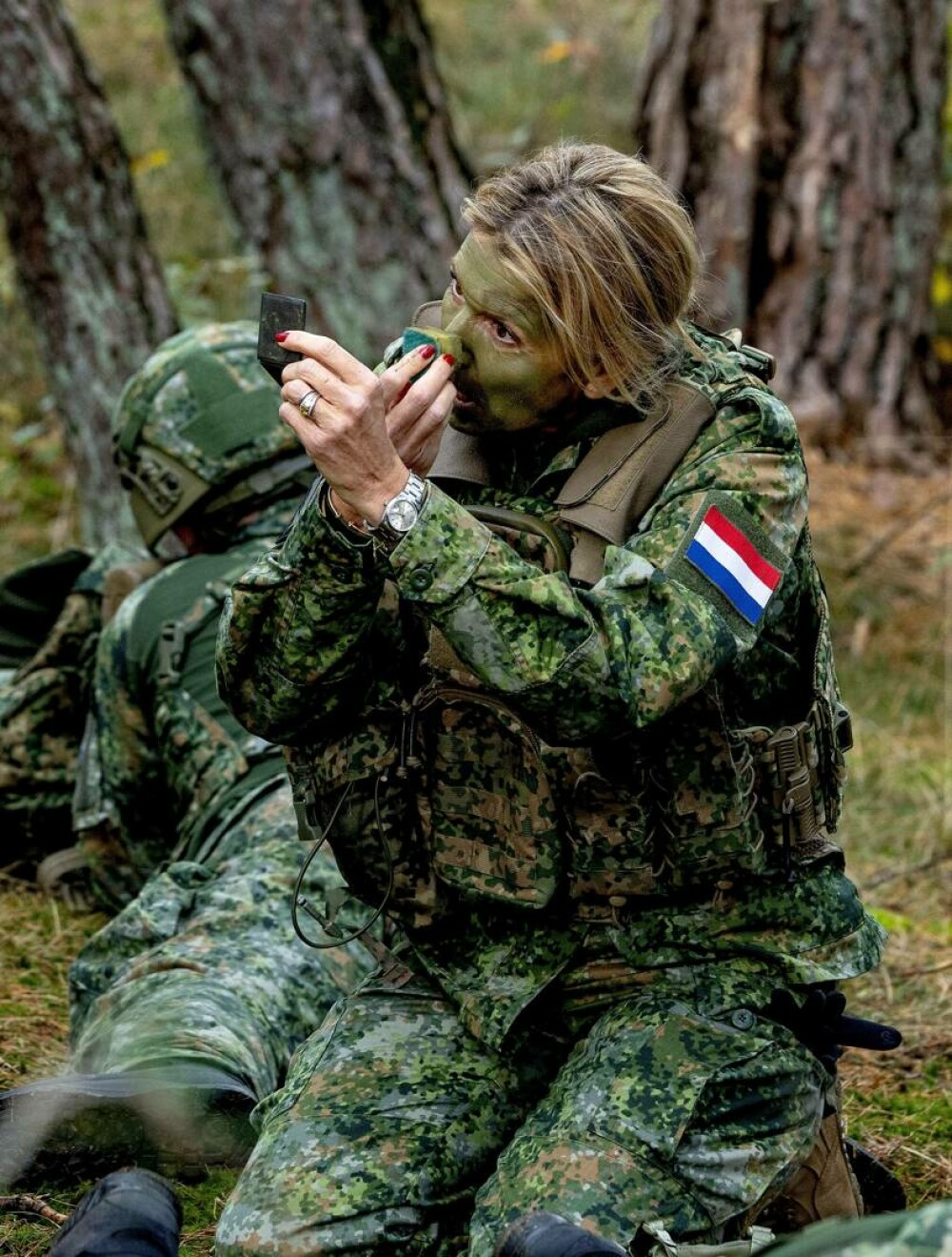 Regina Maxima a Țărilor de Jos, în uniformă militară și cu fața vopsită în culori de camuflaj. Ce s-a întâmplat | FOTO - Imaginea 17