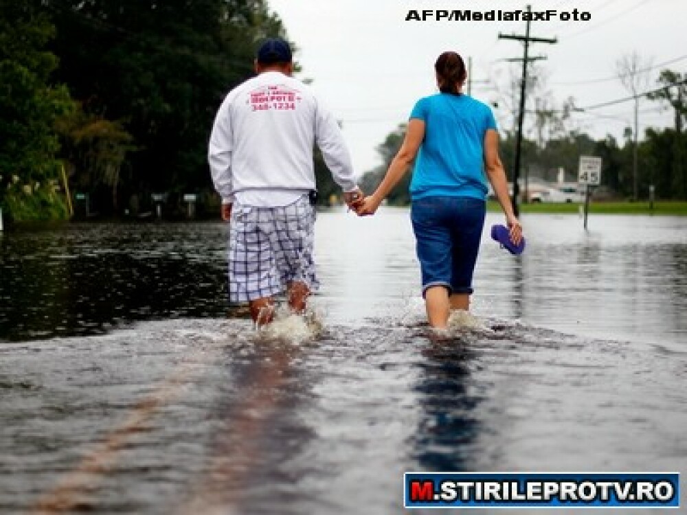 GALERIE FOTO. America inecata de ploile torentiale: 5 morti si 100.000 de oameni evacuati - Imaginea 1
