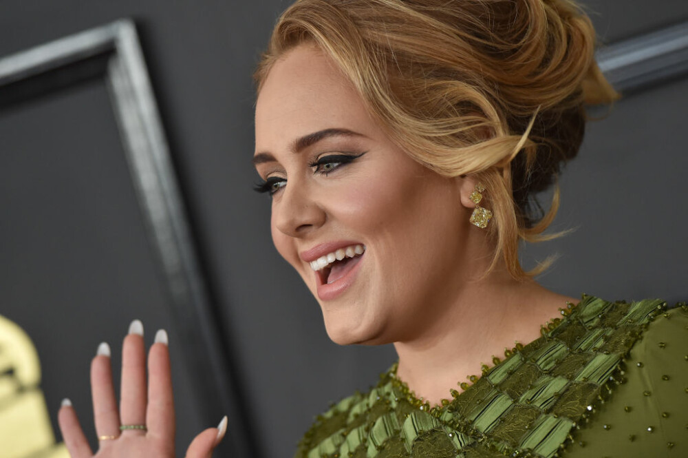 Prima apariție in public a cântăreței Adele, după ce s-a retras din lumina reflectoarelor. Cum arată acum. GALERIE FOTO - Imaginea 5