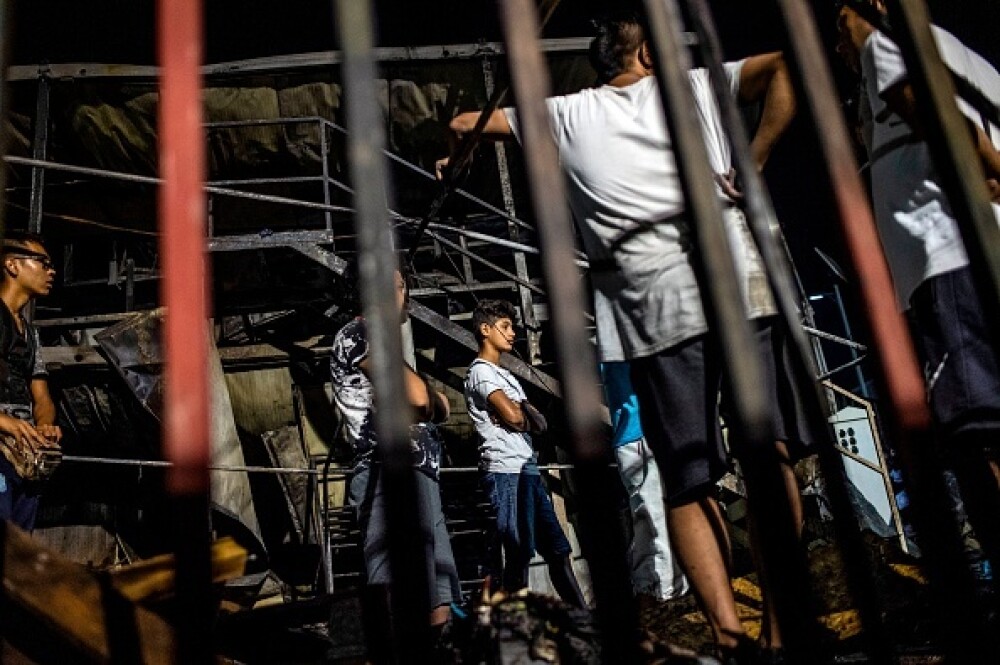 Revoltă și incendiu într-o tabără de refugiați din Grecia. Cel puțin doi morți. FOTO - Imaginea 8