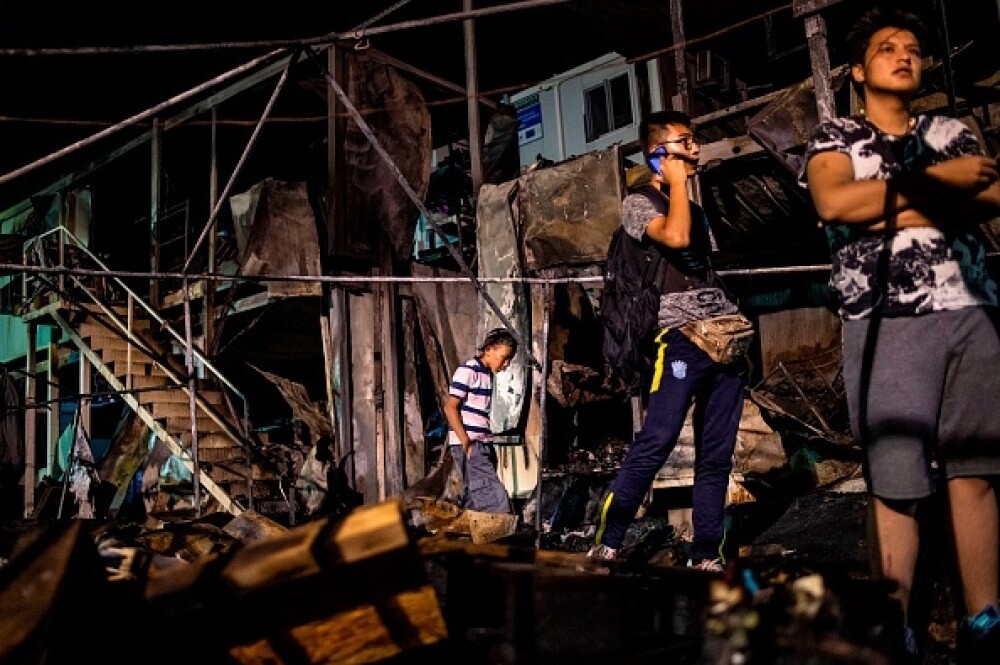 Revoltă și incendiu într-o tabără de refugiați din Grecia. Cel puțin doi morți. FOTO - Imaginea 4
