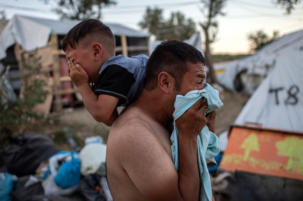 Revoltă și incendiu într-o tabără de refugiați din Grecia. Cel puțin doi morți. FOTO - Imaginea 3
