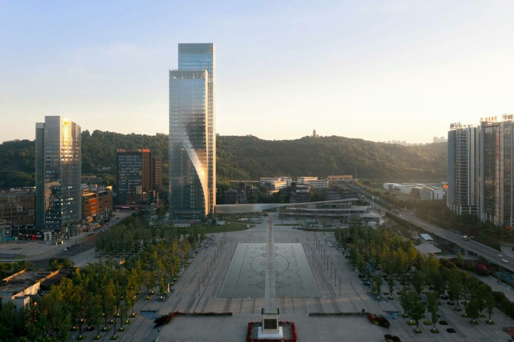 Una dintre cele mai inedite clădiri a fost inaugurată în China. Are 39 de etaje și a fost inspirată de aurora boreală. FOTO - Imaginea 10