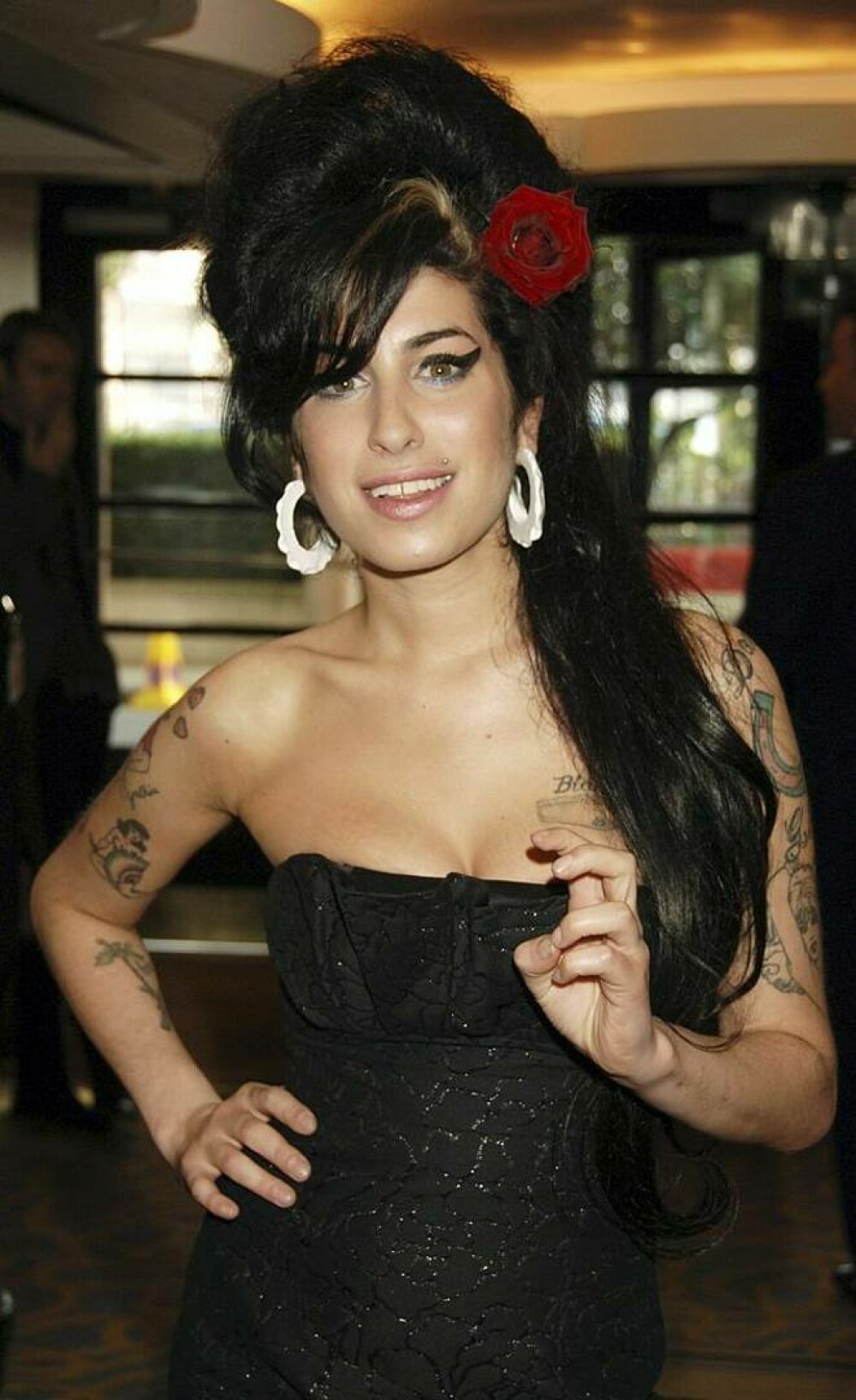 Imagini de colecție cu Amy Winehouse. Cântăreața ar fi împlinit astăzi 40 de ani | FOTO - Imaginea 17