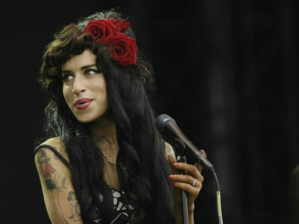 Imagini de colecție cu Amy Winehouse. Cântăreața ar fi împlinit astăzi 40 de ani | FOTO - Imaginea 15