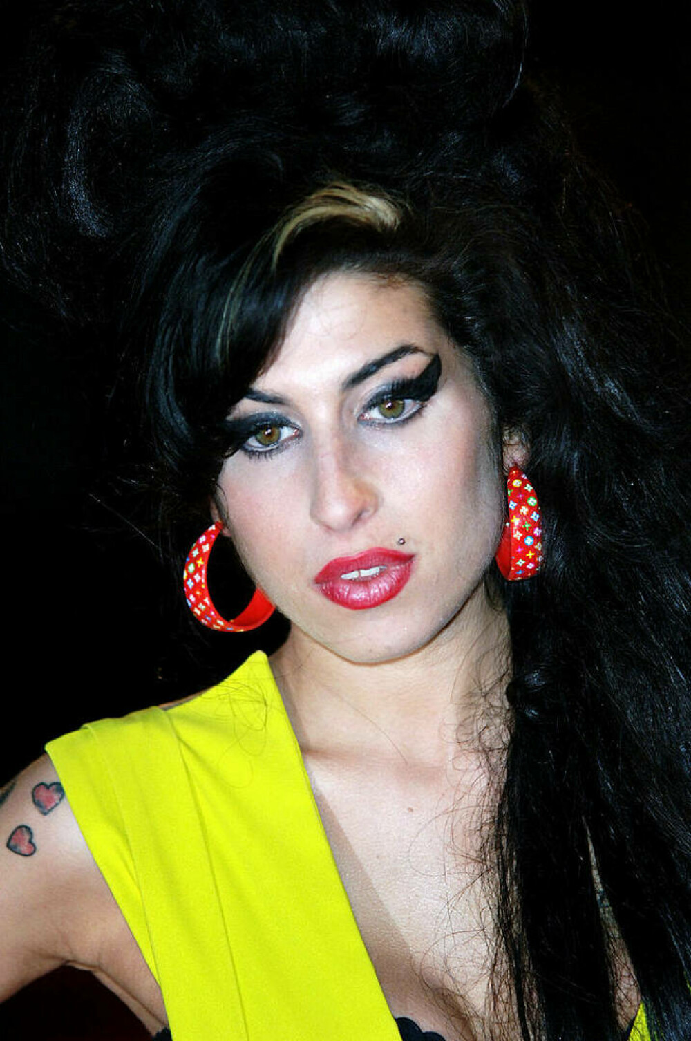 Imagini de colecție cu Amy Winehouse. Cântăreața ar fi împlinit astăzi 40 de ani | FOTO - Imaginea 1