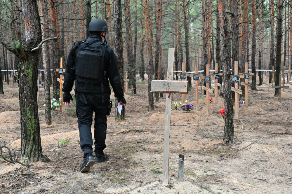 Masacrul din Izium. GALERIE FOTO cu crimele făcute de soldații lui Vladimir Putin - Imaginea 7