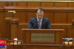 Circ și scandal în Parlament, la dezbaterile privind bugetul de stat. PSD a împărțit păpuși