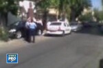 VIDEO. Bataie intre doua familii de interlopi in Capitala. Doi politisti au fost spectatori