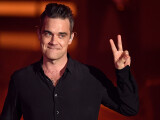 Robbie Williams a mărturisit că suferă de sindromul Tourette. Ce simptome are artistul - VIDEO