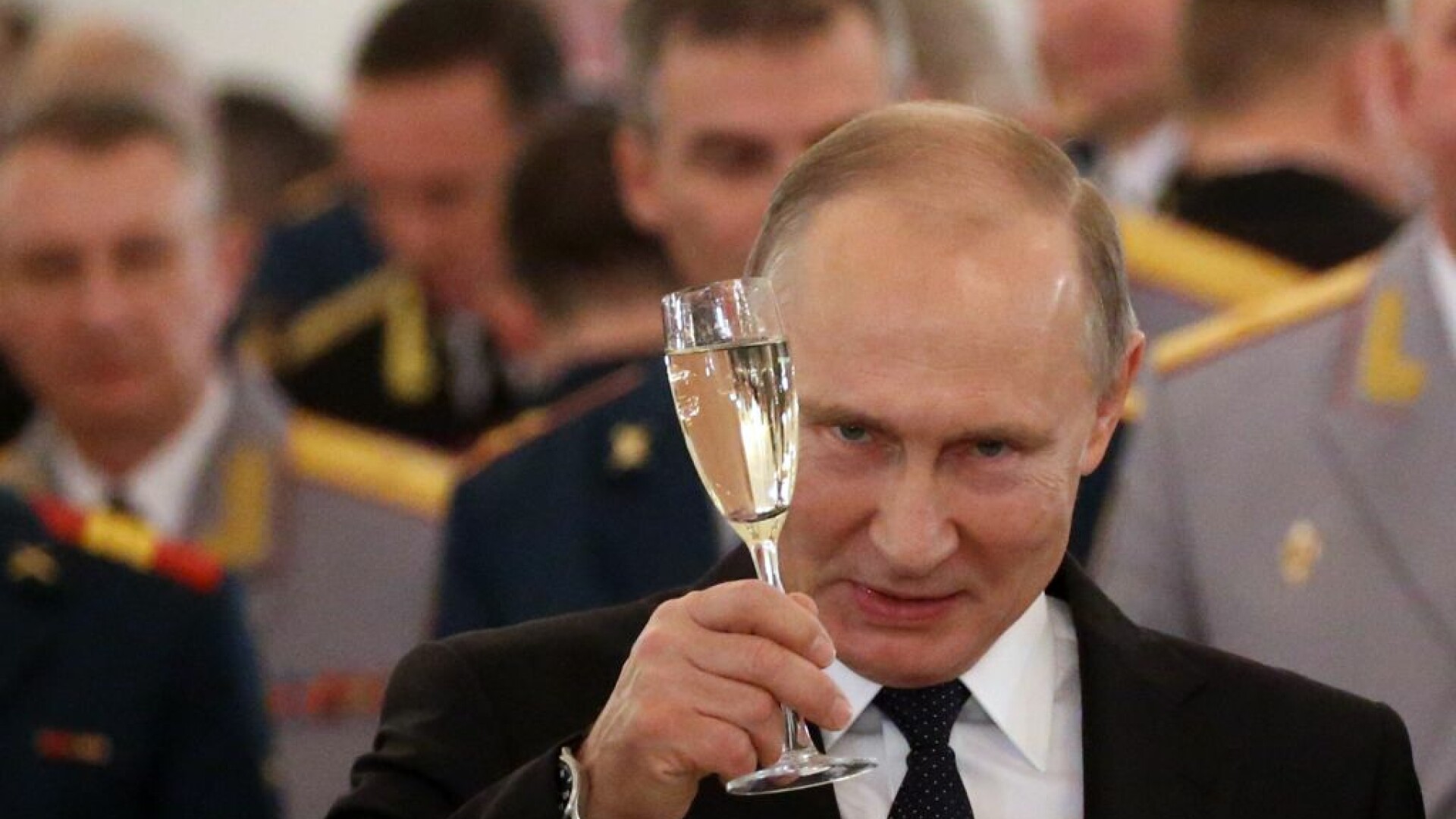 Vladimir Putin la o receptie pentru militarii intorsi din Siria