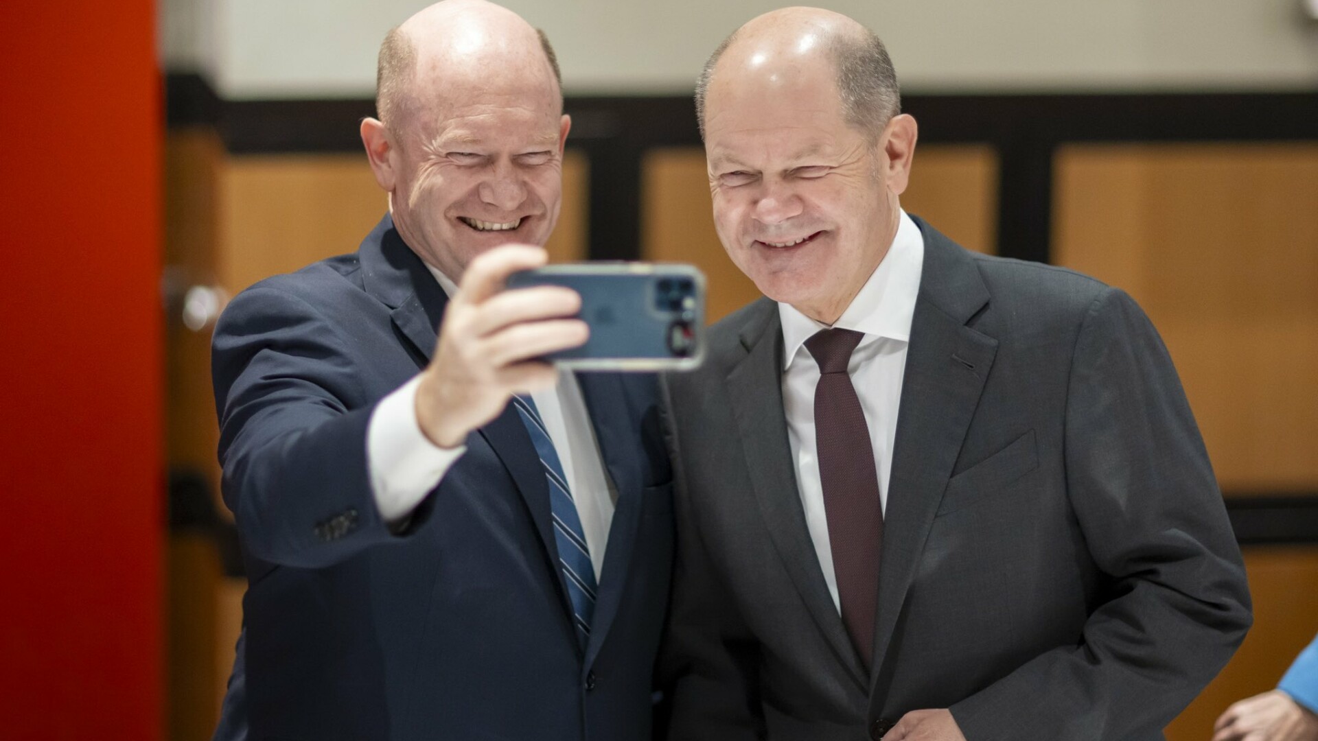 Olaf Scholz Chris Coons