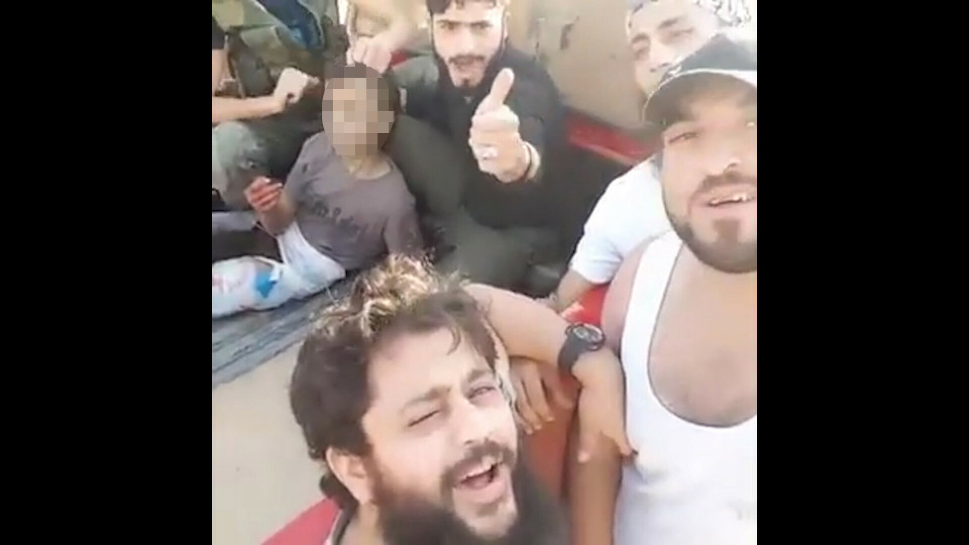 baiat decapitat de rebeli sirieni