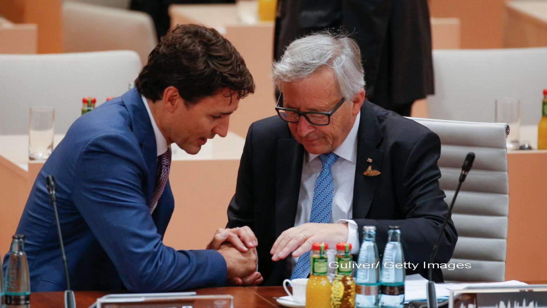 Jean-Claude Juncker, Justin Trudeau - Getty