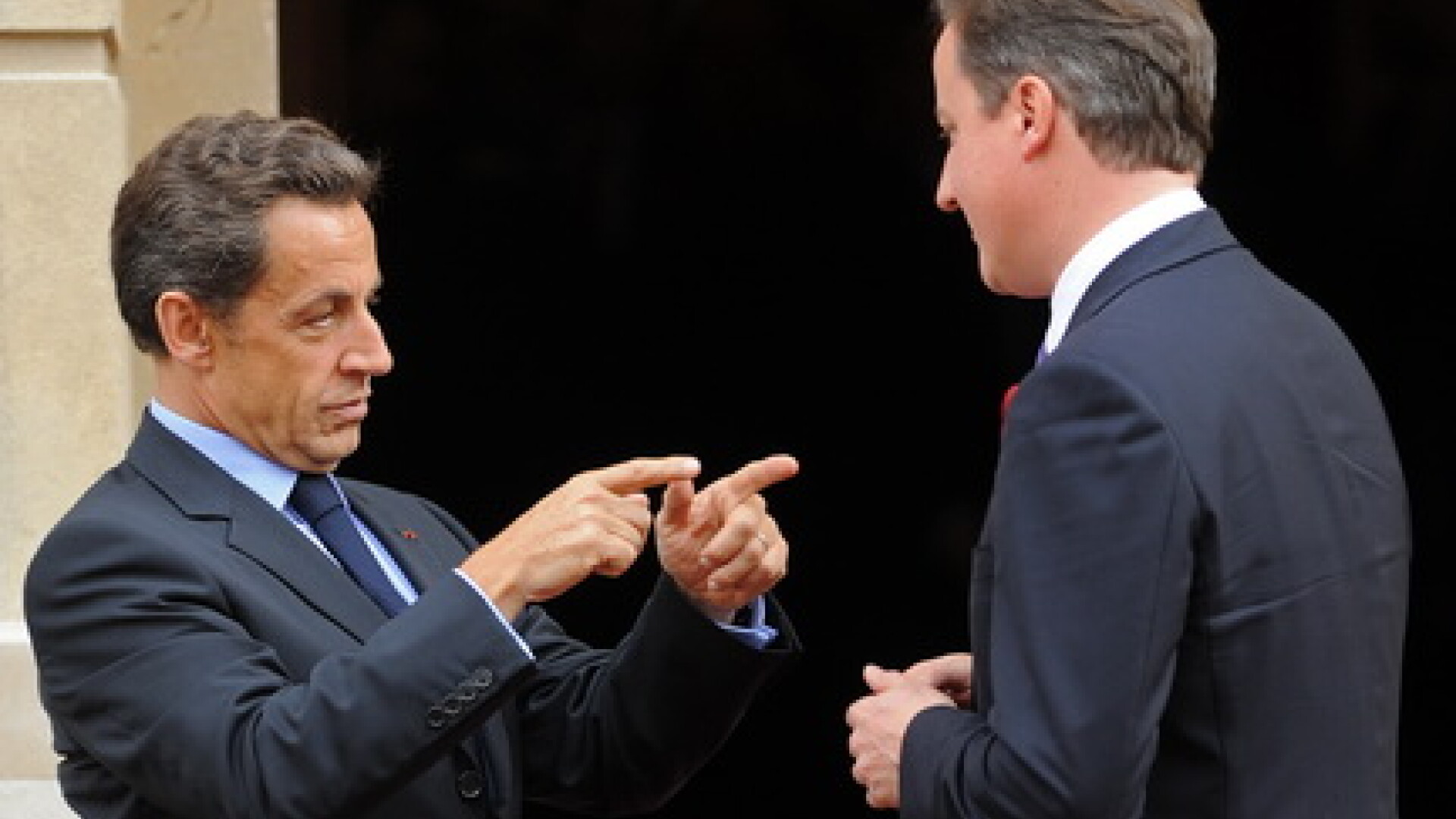 Sarkozy si Cameron