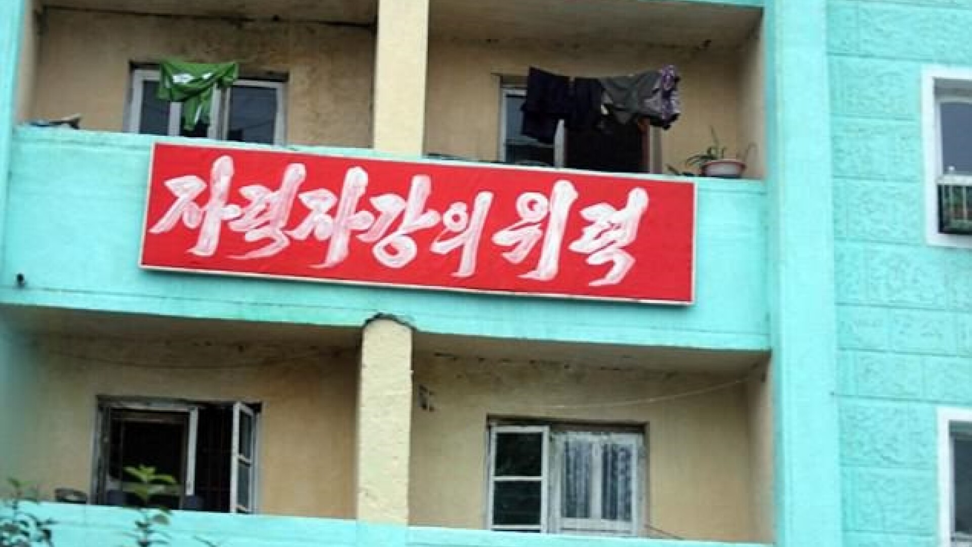 coreea de nord, slogan, banner