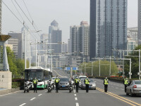 Întreaga Chină a păstrat 3 minute de reculegere în memoria victimelor COVID-19