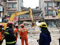 Zeci de dispăruţi în urma prăbuşirii unui imobil de opt etaje în China. FOTO&VIDEO