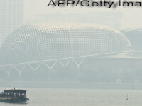 Orasul Singapore, acoperit de un nor de fum inecacios, din cauza poluarii