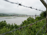gard la granita dintre China si Coreea de Nord, pe raul Tumen