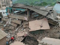 Cel puţin 100 de oameni, blocaţi sub dărâmăturile unei clădiri care s-a prăbuşit într-un oraş din India