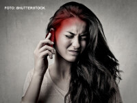 femeie care vorbeste la telefon si o doare capul