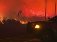 Sudul Californiei, parjolit de un incendiu inspaimantator. Zeci de familii evacuate, si doua autostrazi inchise