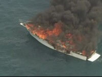 Un iaht cu 5 adulţi şi un copil la bord a luat foc în larg