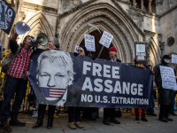 Julian Assange banner