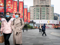 Mai multe oraşe din China impun restricţii din cauza numărului record de îmbolnăviri cu Covid-19