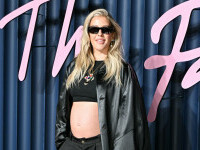 Ellie Goulding și-a surprins fanii. Artista și-a anunțat sarcina direct pe covorul roșu de la Fashion Awards. GALERIE FOTO