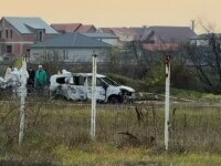 Un cadavru carbonizat a fost descoperit de un curier într-o mașină, lângă Oradea. Anchetatorii nu exclud ipoteza unei crime