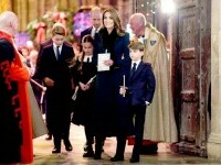 Prinţul William şi fiul său George au făcut voluntariat la o organizaţie caritabilă pentru persoanele fără adăpost. FOTO