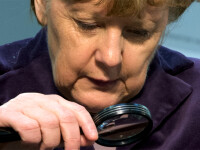 Angela Merkel privind printr-o lupa