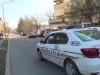 masina de politie pe strada