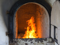 Căldura de la un crematoriu, folosită la încălzirea unui oraș. Unde se analizează această propunere