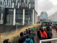 Protest masiv al fermierilor, din nou la sediul UE. Anvelope incendiate și cisterne cu dejecții