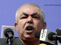 Afghan vice-presidential candidate Abdul Rahid Dostum, who is campaigning with presidential candidate Ashraf Ghani Ahmadzai, addresses the crowd during a gathering in the outskirts of Kunduz province, north of Kabul on March 19, 2014. Afghanistan's April 