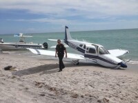 Un tata din Statele Unite a murit iar fiica lui este in stare grava dupa ce un avion usor s-a prabusit peste ei, pe o plaja